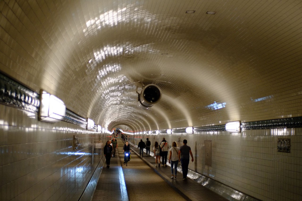 An inside photo of the tunnel featuring a big turbine fixed to the top of the tunnel.