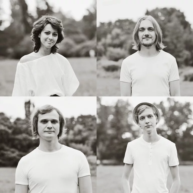 A black-white photo collage of four band members all dressed in white tops.